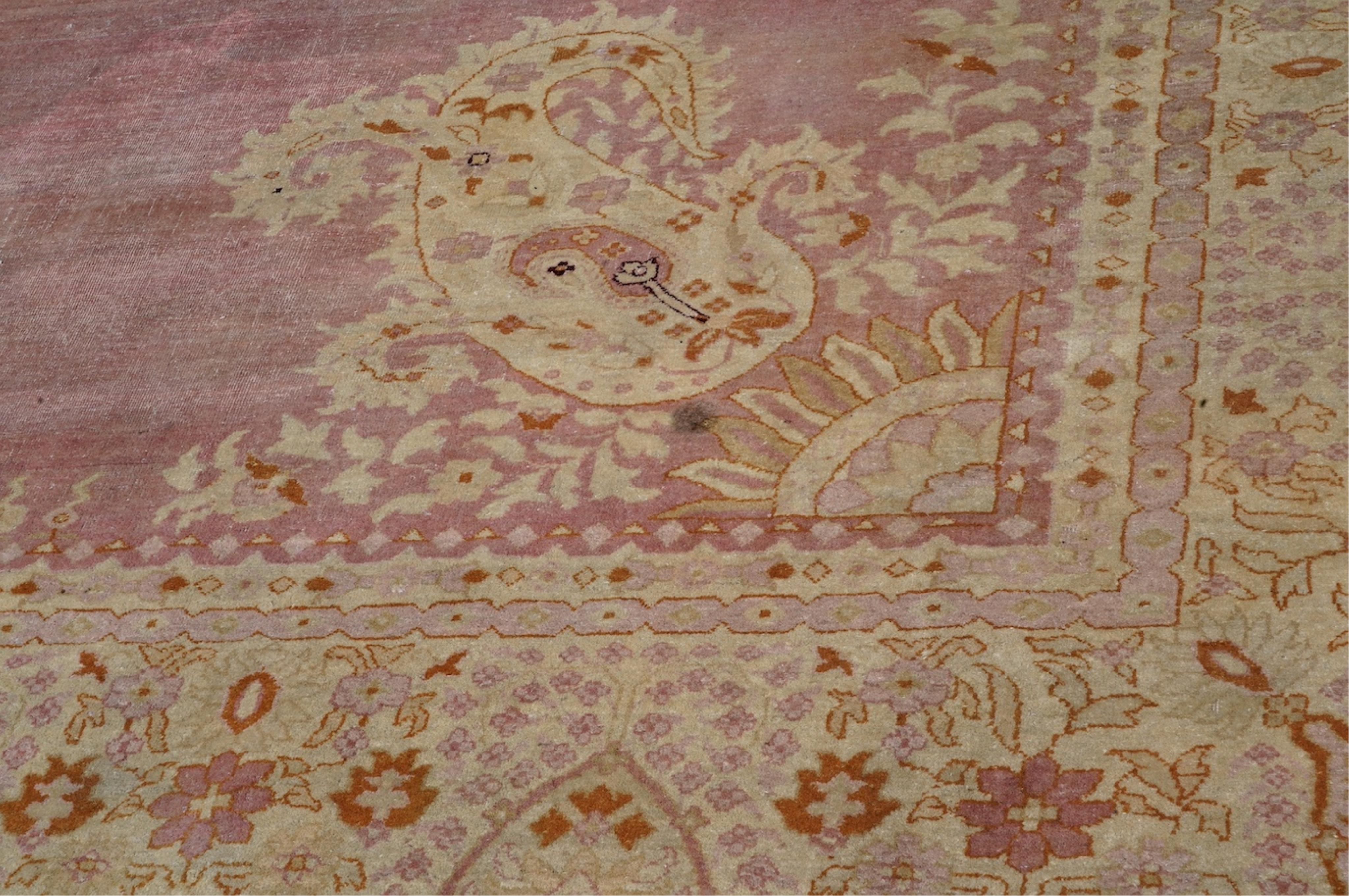 An Amritsar carpet, approximately 580 x 395cm. Condition - fair